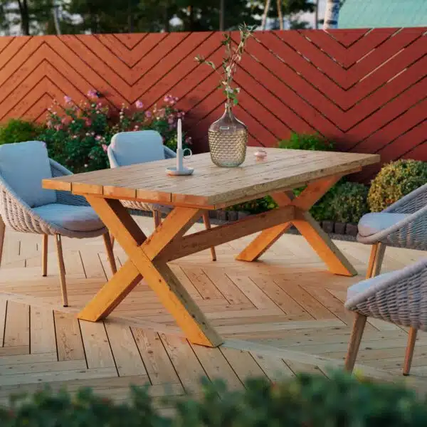 Cross table Torpa red stain at sunset