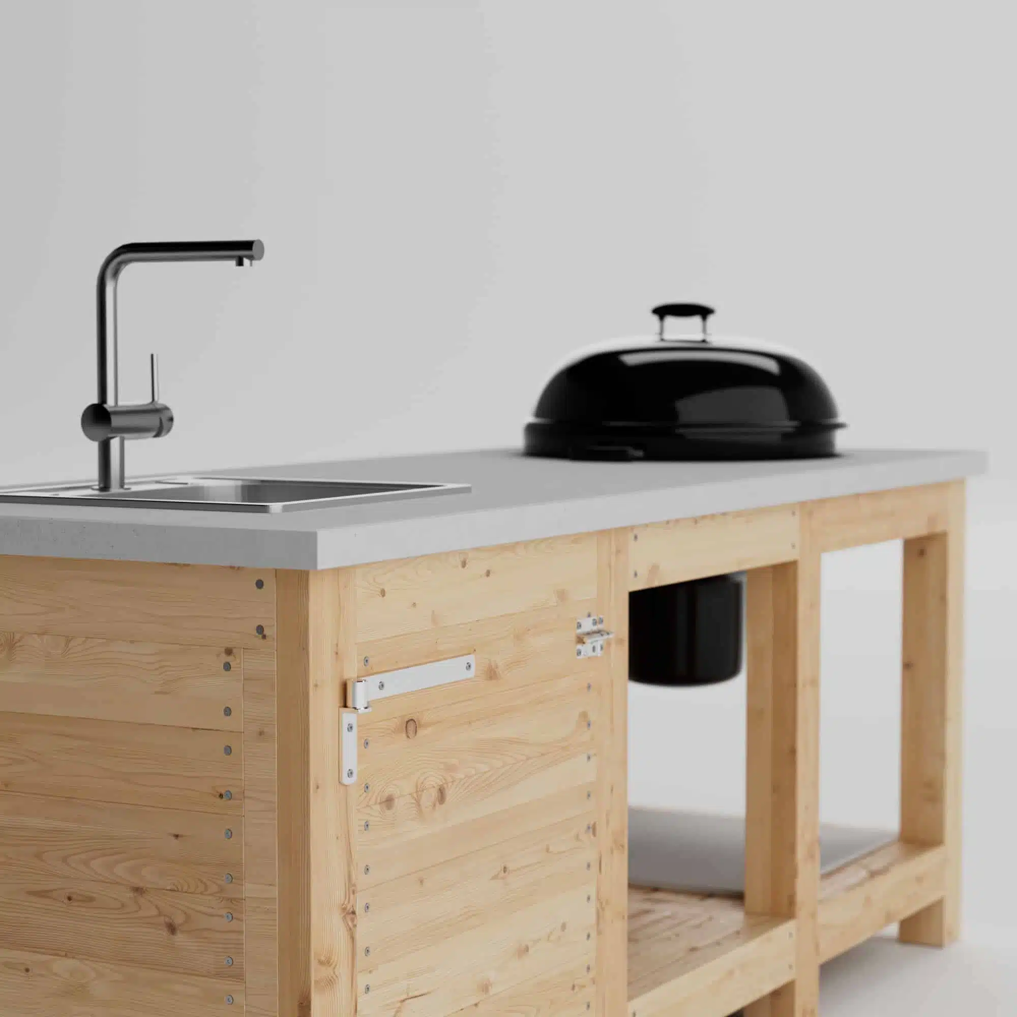 Outdoor kitchen with concrete countertop and grill close-up
